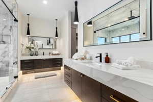 Primary bathroom with vanity and walk in shower