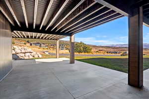 View of patio / terrace featuring a mountain view