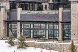 View of snow covered property entrance