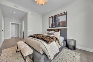 Bedroom featuring hardwood / wood-style flooring