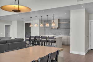 Dining room with hardwood / wood-style floors