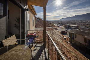 Balcony with a mountain view and a grill