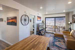 Living room featuring dark hardwood / wood-style flooring