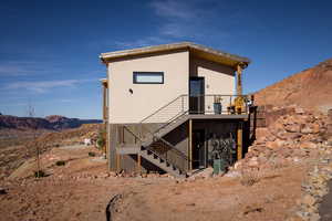 Rear view of house with a mountain view