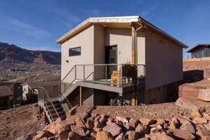 Rear view of property featuring a mountain view