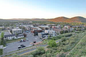 Aerial view at dusk featuring a mountain view