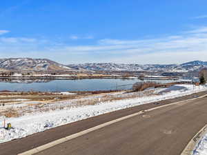 Mountain view featuring a water view