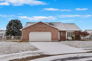 View of front of property with a garage