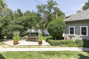 View of yard with a patio area