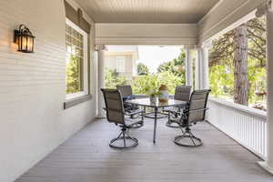 Sunroom / solarium with ornate columns and wooden ceiling