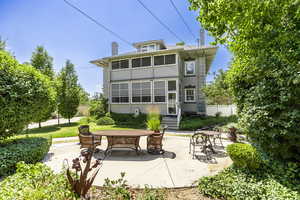 Rear view of house with a patio area