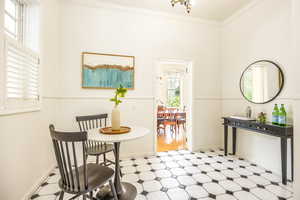 Sitting room featuring ornamental molding