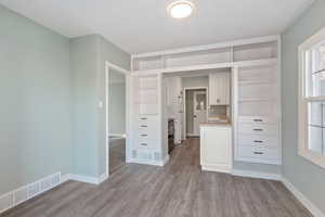 Unfurnished bedroom featuring light wood-type flooring