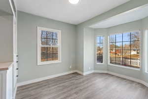 Interior space with plenty of natural light and light wood-type flooring