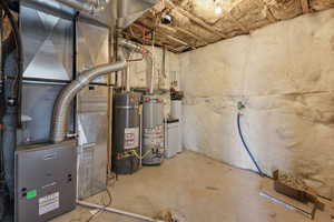 Utilities featuring gas water heater and heating unit