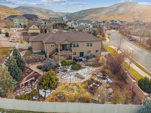 Birds eye view of property with a mountain view