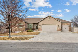 Ranch-style home featuring a garage