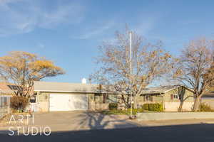 Ranch-style home with a garage