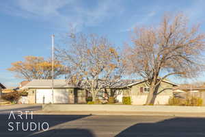 Single story home with a garage