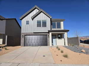 View of front of home featuring a garage