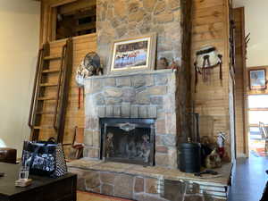 Living room featuring a fireplace and hardwood / wood-style floors