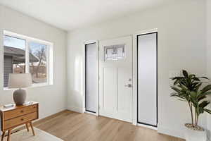 Foyer featuring light wood-type flooring