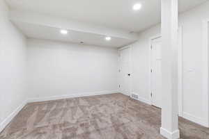 Basement with carpet floors