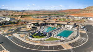 Birds eye view of property with a mountain view