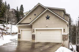 View of front of home featuring a garage