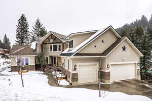 View of front of home featuring a garage