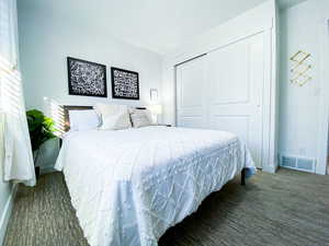 Upstairs Queen Bedroom featuring a closet