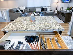 Upstairs Kitchen details with light hardwood / wood-style floors