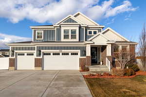 Craftsman-style house featuring a garage