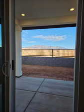 View of patio with a mountain view