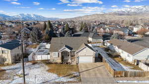 Snowy aerial view with a mountain view