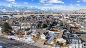 Snowy aerial view with a mountain view