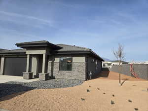 Prairie-style house featuring a garage