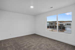 Empty room featuring carpet