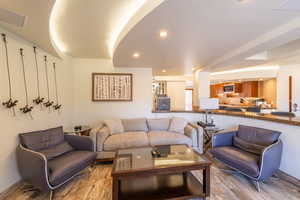 Living room with hardwood / wood-style floors