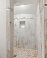 Bathroom with tiled shower