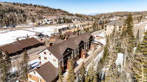 Snowy aerial view with a residential view