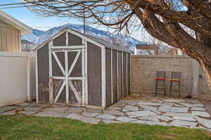 View of outdoor structure featuring a mountain view