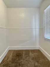 Unit #1 - Unfurnished room featuring carpet floors