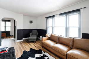 Living room featuring hardwood / wood-style floors and a wealth of natural light