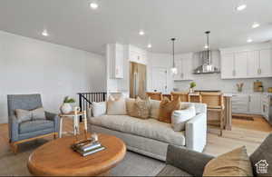 Living room with light wood-type flooring