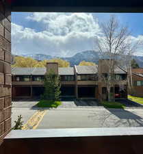 View of front of property with a mountain view