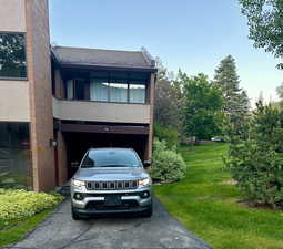 View of front of property with a front lawn