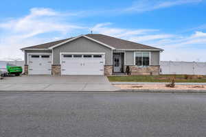 Craftsman house featuring a garage