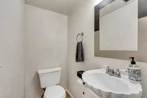 Bathroom with vanity and toilet