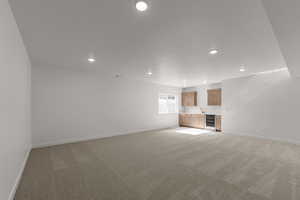 Wet bar in basement living room.